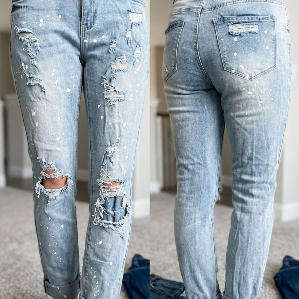 Paint splattered ripped stretchy jeans